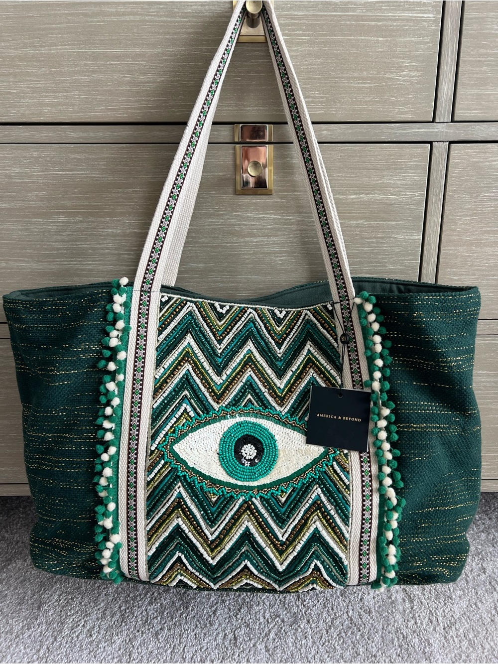 NWT America and Beyond emerald and gold evil eye tote bag